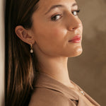 Woman with brown hair model with Gold filled 15mm hoops with pearl necklace