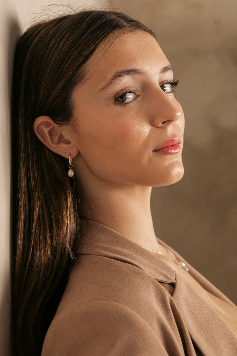 Woman with brown hair model with Gold filled 15mm hoops with pearl necklace