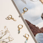 Close-up of the Christine enamel hoops highlighting the blue and white colour combination.
