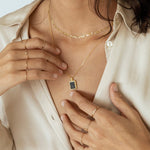 16-inch Figaro Necklace showcasing its rich golden finish and classic chain design.