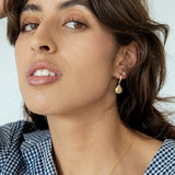 Gold-filled Alana Seashell Necklace showcasing its coastal-inspired design.