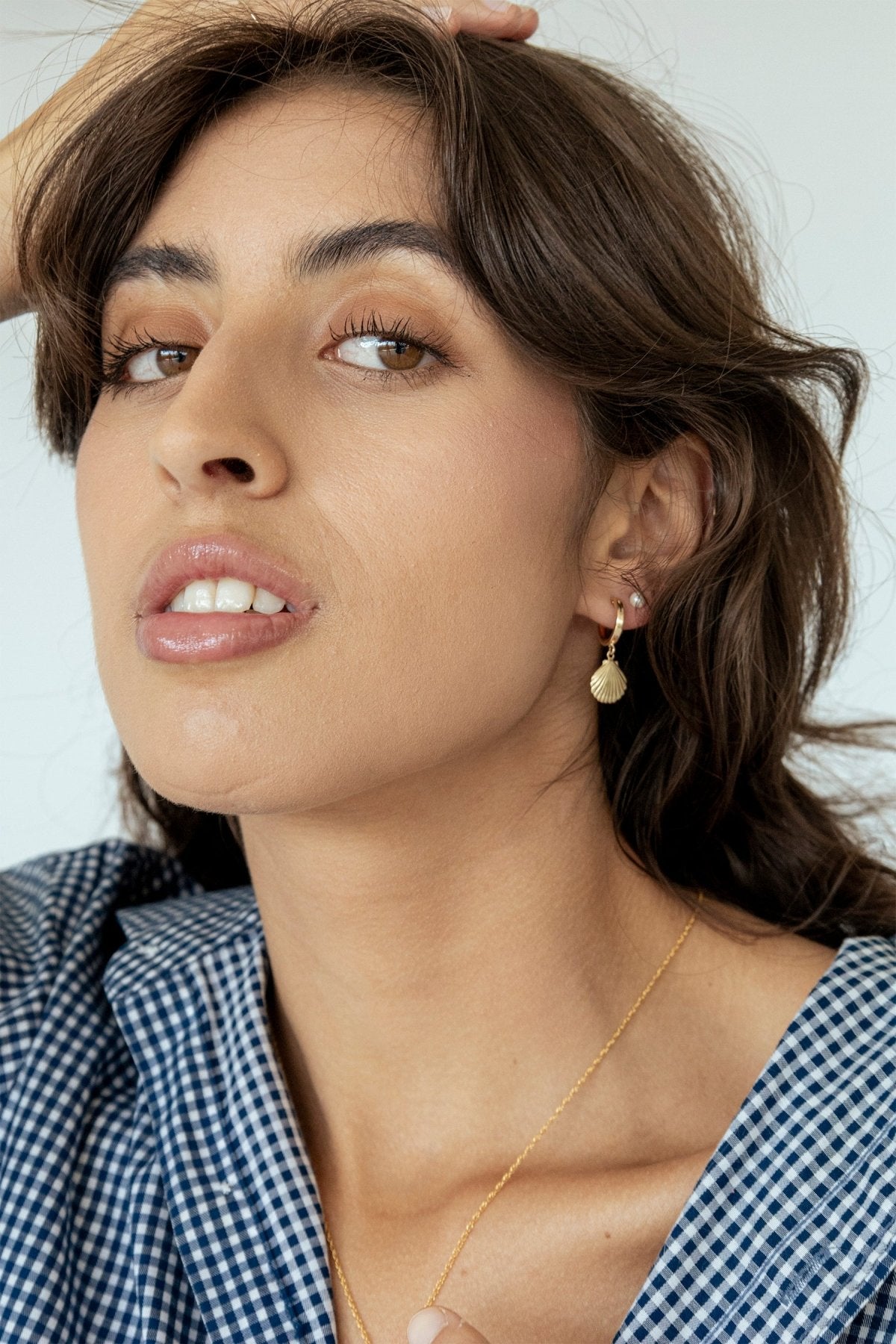 Gold-filled Alana Seashell Necklace showcasing its coastal-inspired design.