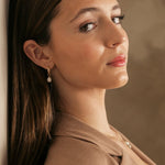 Woman with brown hair model with Gold filled 15mm hoops with pearl necklace