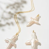 Gold necklace with cross pearl pendant