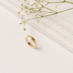 Hammered thick band gold ring